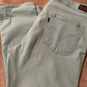 Teal Levi’s skinny jeans